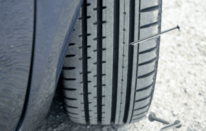spiritual meaning of a nail in a tire