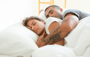 sleeping with a man in a dream spiritual meaning